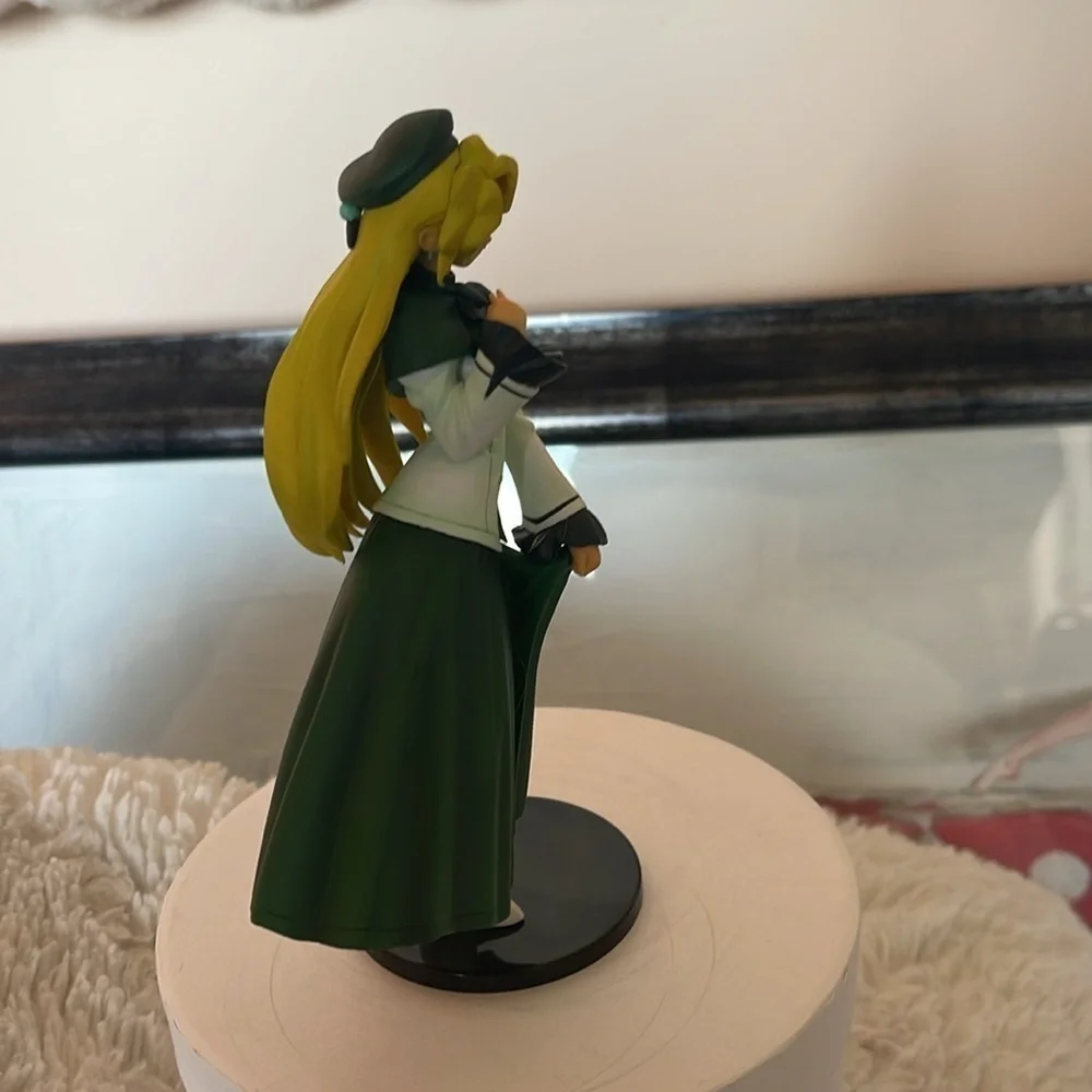 Green and White Anime Figurine